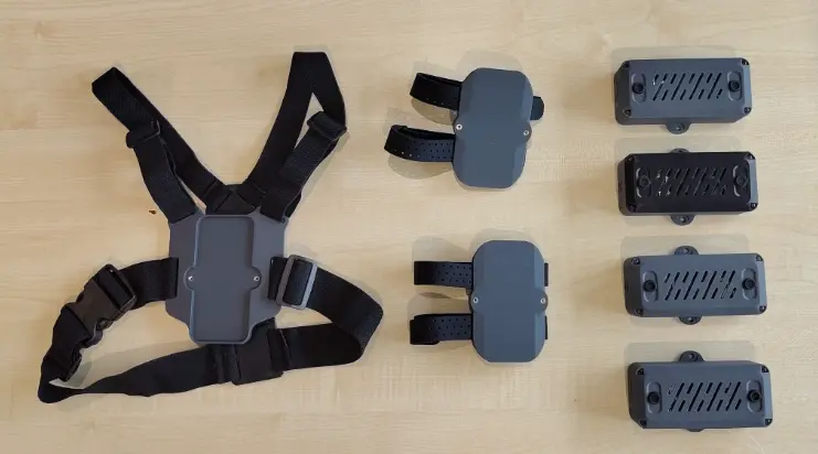 M-One body harness, wearable adapters, and tracker modules