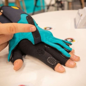 Mimetik glove on hand. Disconnecting the base glove